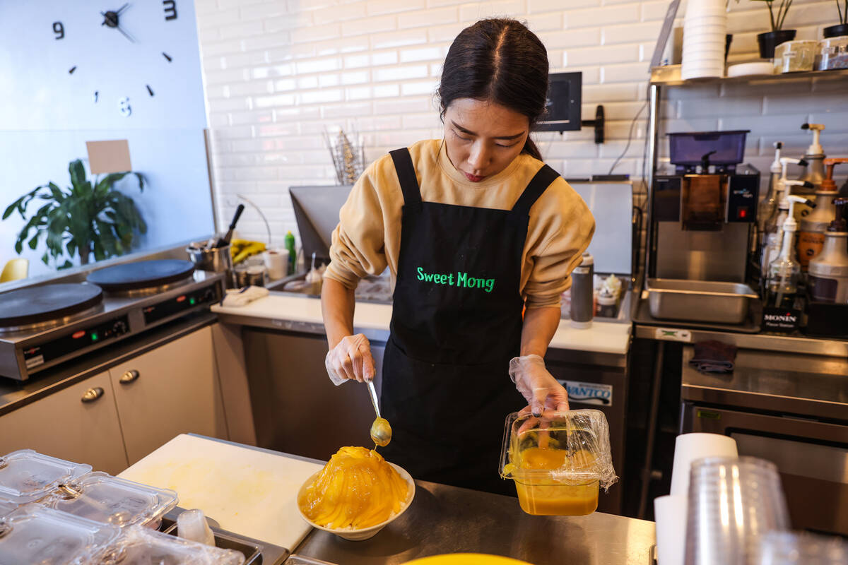 Amy Park, co-owner and manager, makes mango bingsoo, Korean shave ice, at Sweet Mong in Las Veg ...